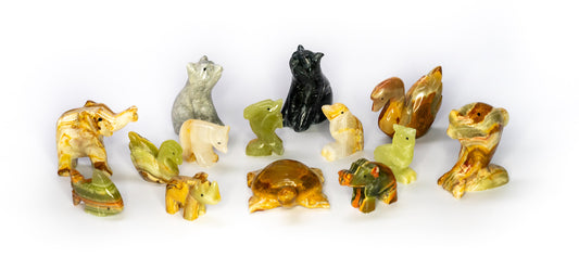 A range of animal figures made from onyx and marble