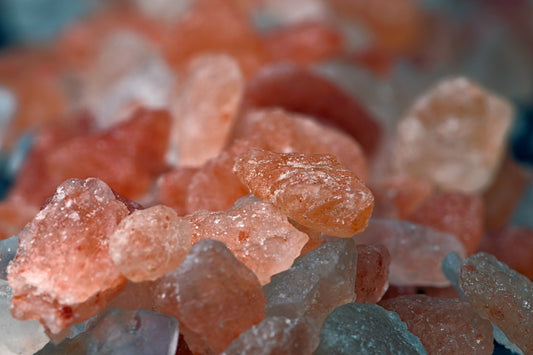 an up close image of small himalayan salt chunks