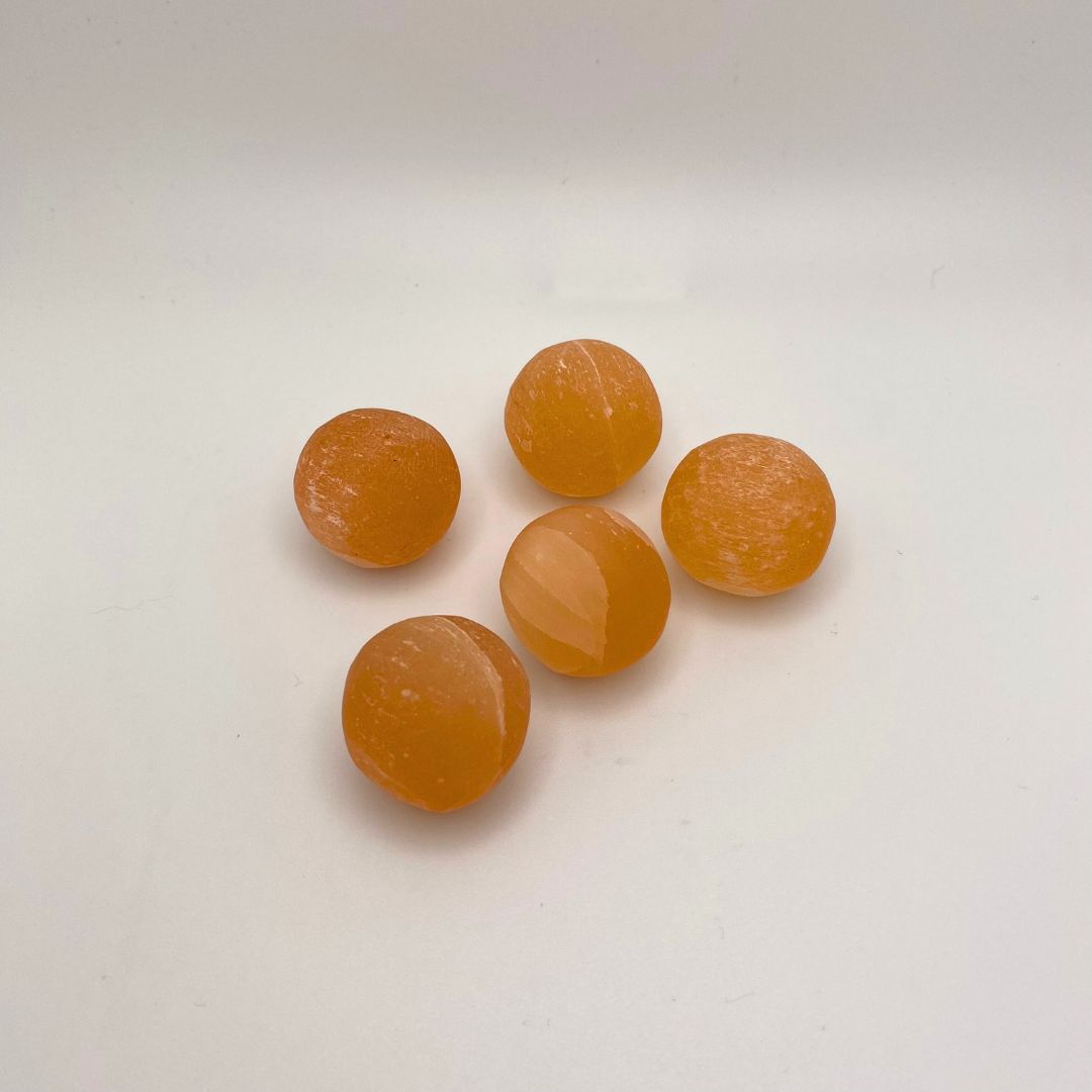 Selenite orange tumbled stones